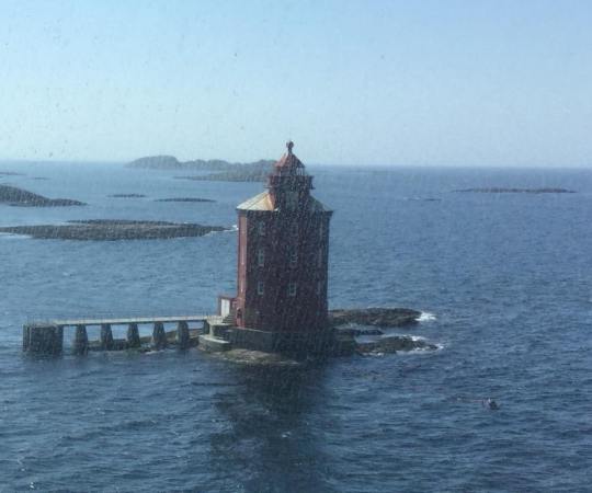 a lighthouse in the rain